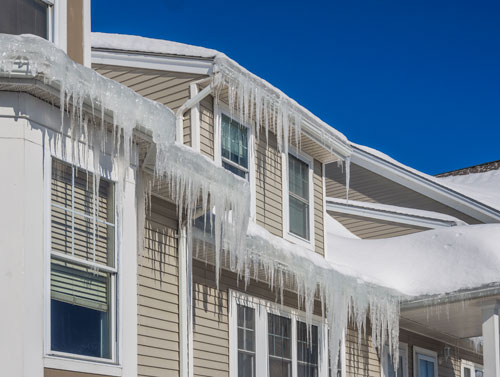 What causes roof ice dams and how can you prevent them?